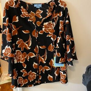 This is a beautiful never been worn blouse from CeCe
